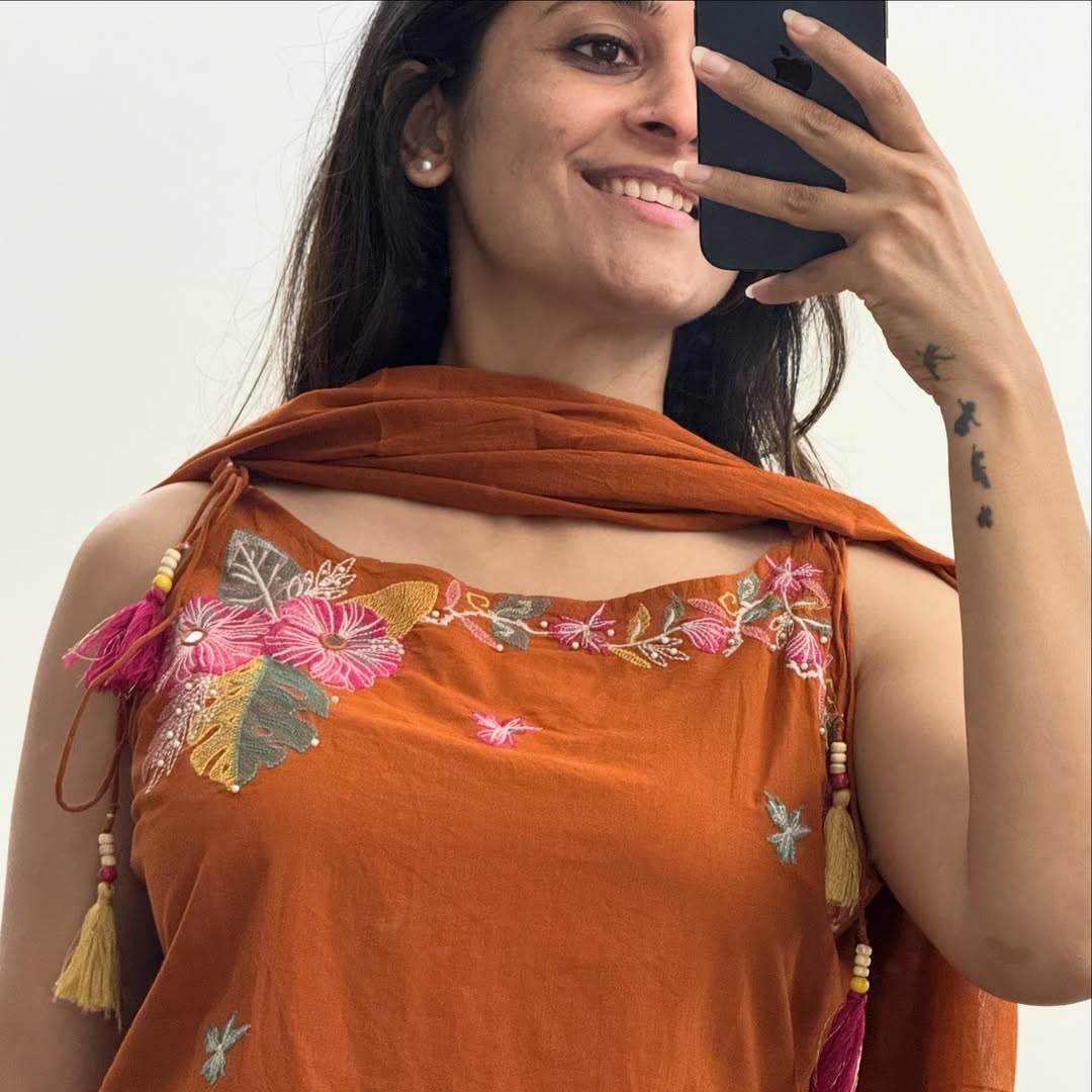 Sleeveless kurta with elegant embroidery work.