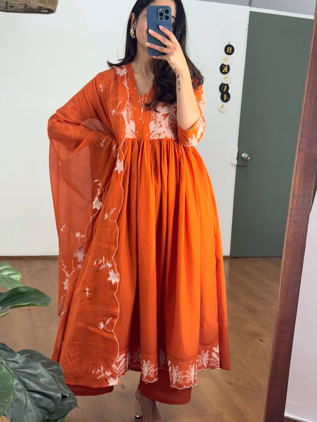 Rust colour Kurta with elegant embroidery work.