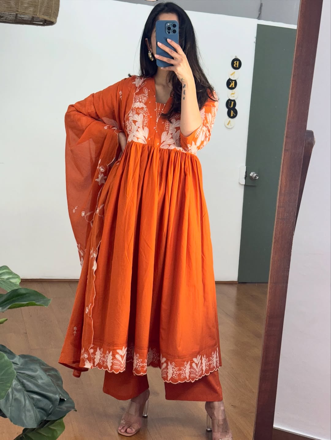 Rust colour Kurta with elegant embroidery work.