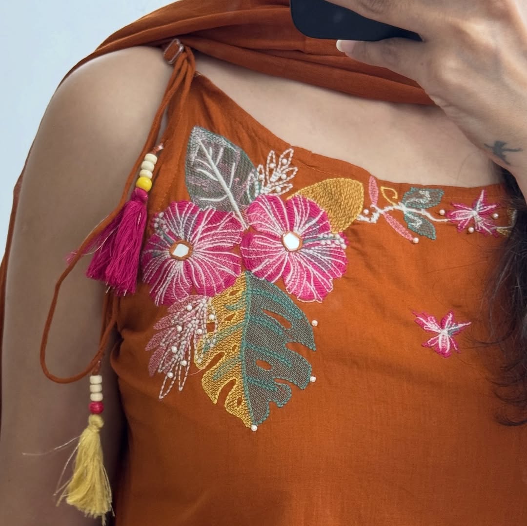 Sleeveless kurta with elegant embroidery work.